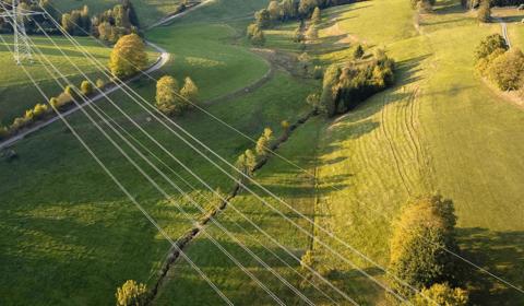 Agricultural fields and electricity lines.