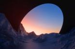 Circular geometric form over a mountain landscape at sunset