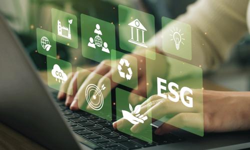 Women use a computer to analyze ESG icons