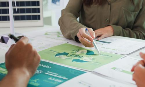 Closeup group of businesspeople talk ESG strategies