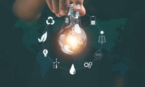 Hand holding light bulb with icons energy sources for renewable