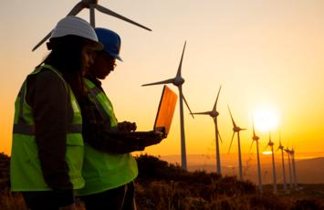Laptop workers at a wind farm